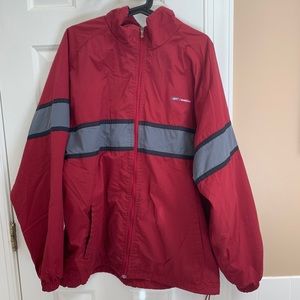 A vintage red and grey Reebok jacket.